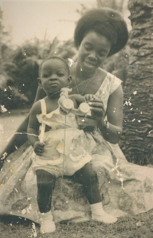 Florence as a baby with her mother in Nigeria.