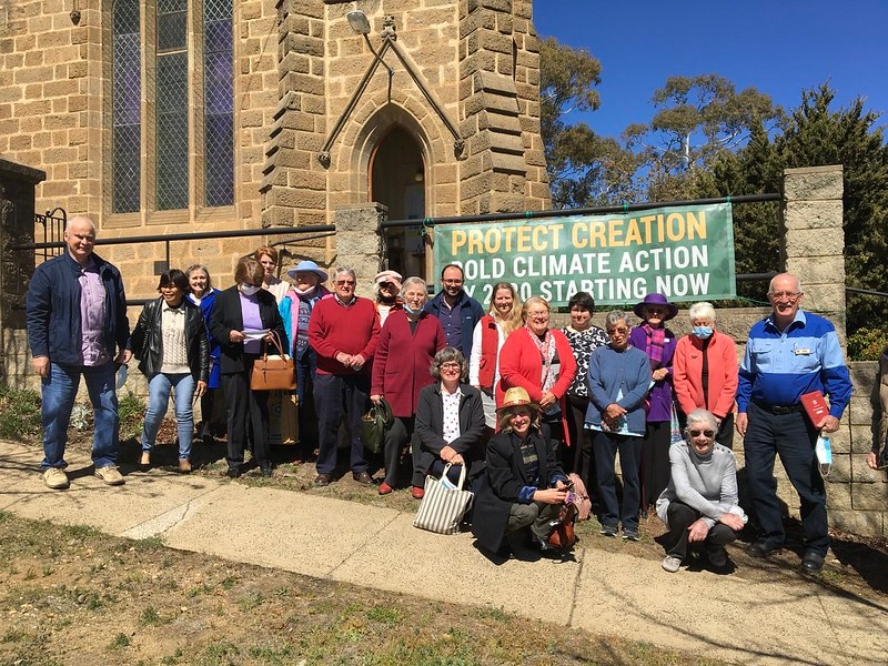 Congregants at Cooma Uniting Church, NSW, Australia, hold a rally to call for bold action on climate change.