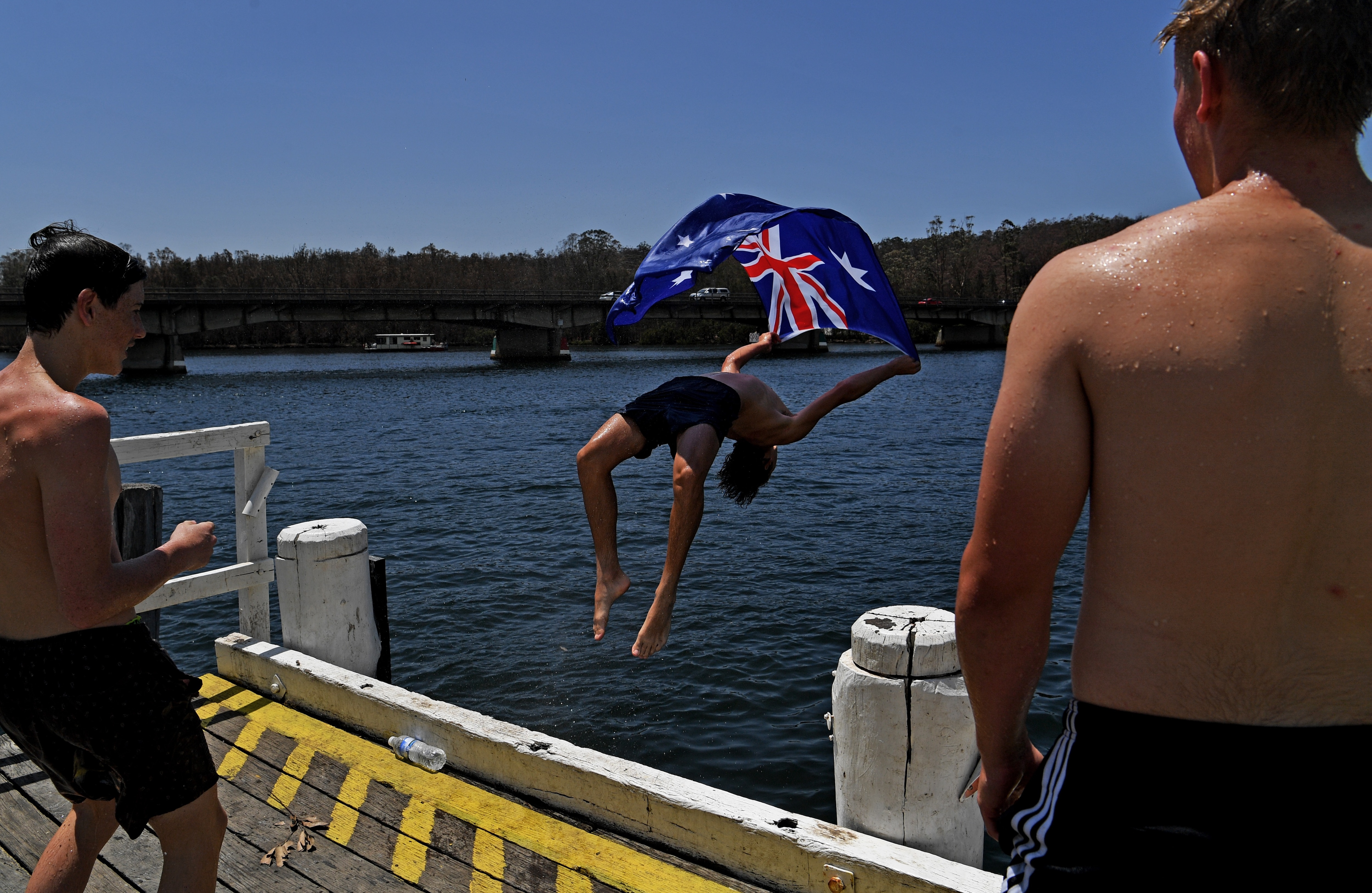 Local residents cool off in Clyde River near Batemans Bay. Local residents cool off in Clyde River near Batemans Bay.