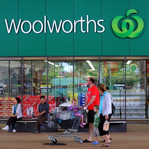 Shoppers outside a Woolworths grocery store in Brisbane