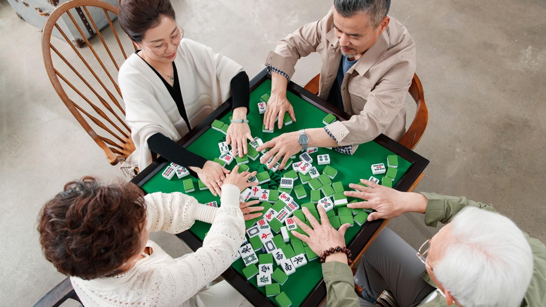 Retired men and women playing