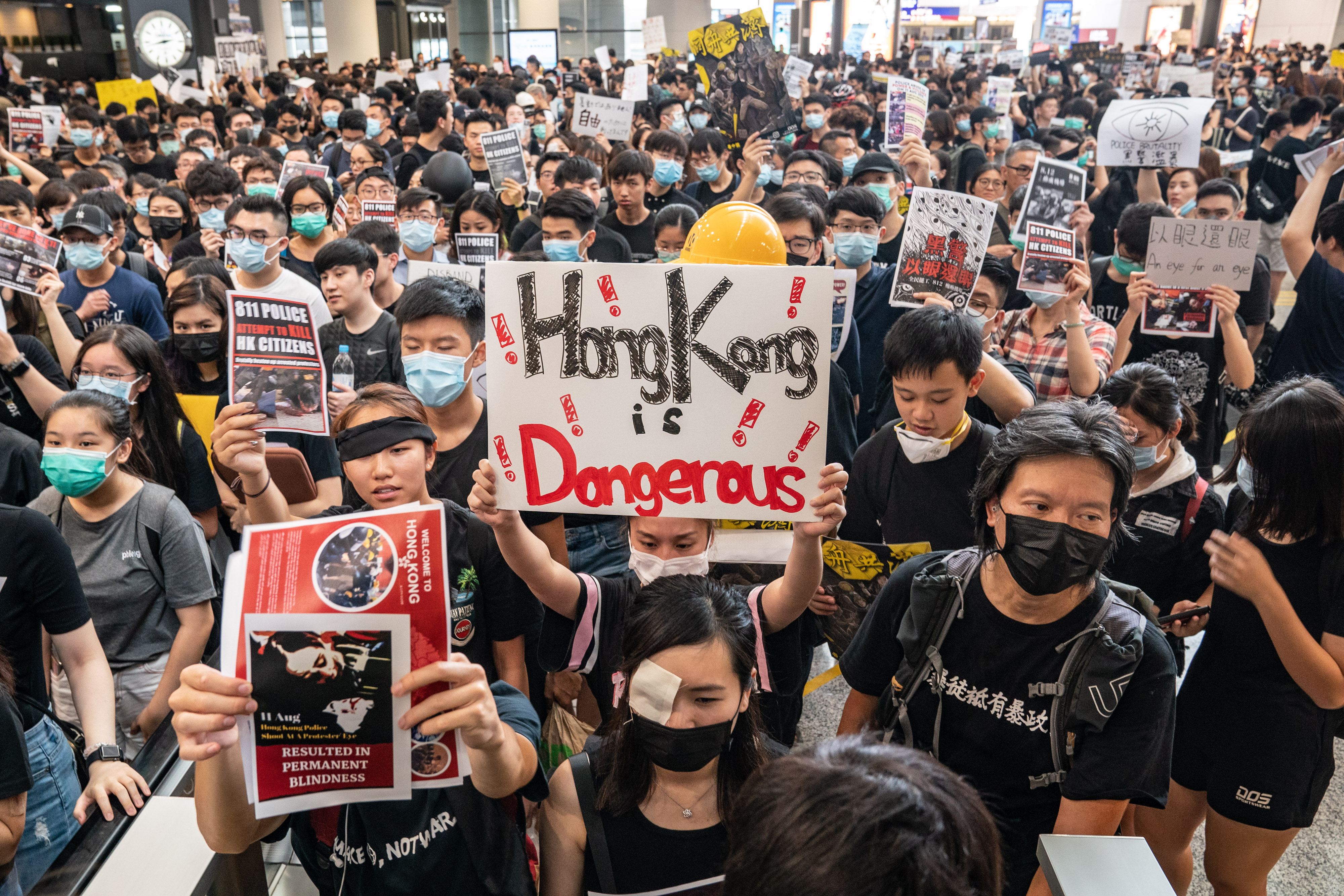 Protesters occupy the arrival hall of the Hong Kong International Airport during a demonstration.