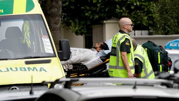 Ambulance staff take a man from outside a mosque in central Christchurch, New Zealand, Friday, March 15, 2019. Ambulance staff take a man from outside a mosque in central Christchurch, New Zealand, Friday, March 15, 2019. A witness says many people have been killed in a mass shooting at a mosque in the New Zealand city of Christchurch.