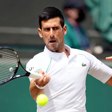FILE: Novak Djokovic, Serbian professional tennis player and is ranked as world No.1 by ATP, hits a ball during final match of 2021 Wimbledon Championships at All England Lawn Tennis and Croquet Club in London, United Kingdom on July 12, 2021. Australian 
