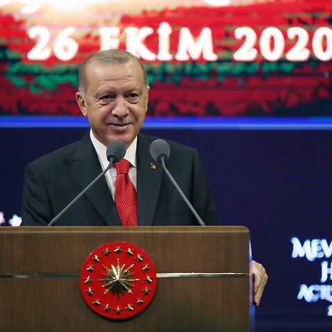 Turkey's President Recep Tayyip Erdogan delivers a speech in Ankara, Turkey, Monday, Oct. 26, 2020. 
