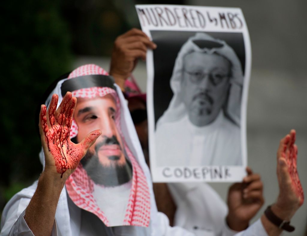 A demonstrator dressed as Saudi Arabian Crown Prince Mohammed bin Salman protests outside the Saudi Embassy in Washington, DC, on 8 October, 2018.