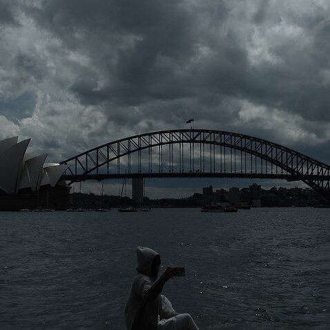 Stop clouds over the Sydney Harbour Bridge and Opera House in Sydney, Thursday, September 30, 2021. People in NSW are being urged to prepare for the looming storm season, with widespread heavy rain, dangerous winds and possible flash flooding predicted.