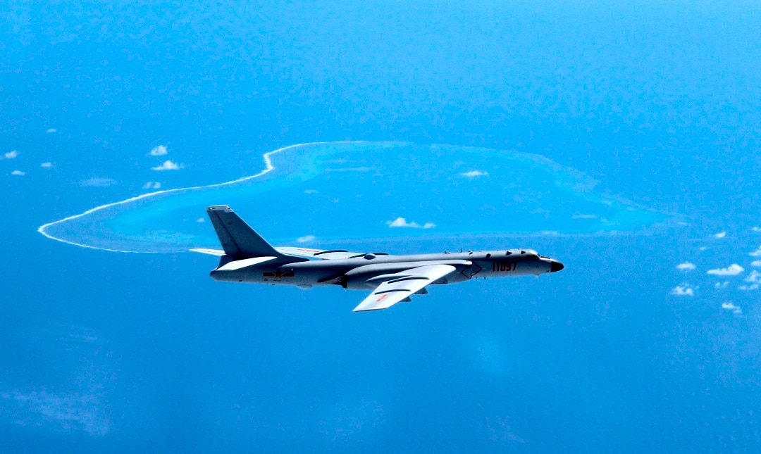 A Chinese H-6K bomber patrols the islands and reefs in the South China Sea. 