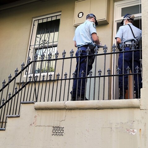 A supplied image obtained on Wednesday, April 1, 2020, of the NSW Police Force and the Australian Defence Force conducting Public Health Order checks at homes and businesses in Sydney. (AAP Image/Supplied by NSW Police) NO ARCHIVING, EDITORIAL USE ONLY