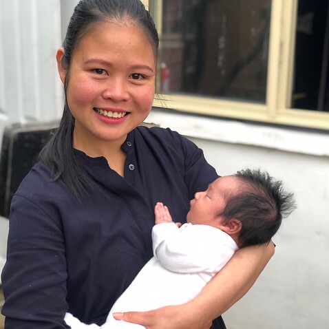 Thanh Binh with baby Joe.