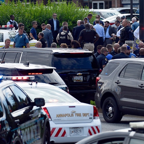 shooting police suspect blocked newspaper door sbs unfolded maryland newsroom warzone inside