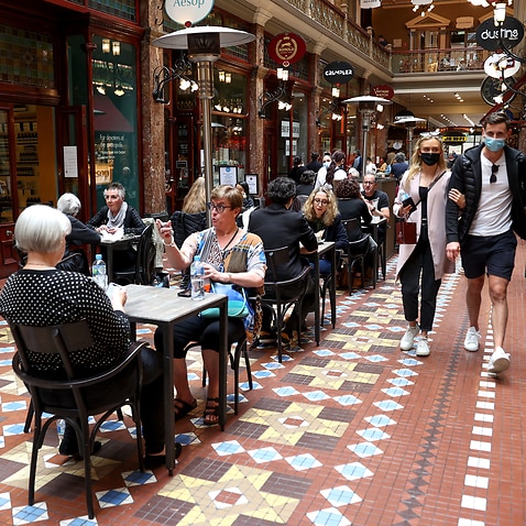 eople shop and dine at cafes inside Strand Arcade in Sydney, Saturday, October 16, 2021. After 106 days