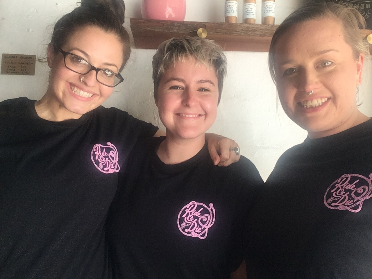 Lana De Angelis (left) and her wife/business partner Nicolette Lewis (right) and Ruby Lonesome manager Lisa Smullen (centre).