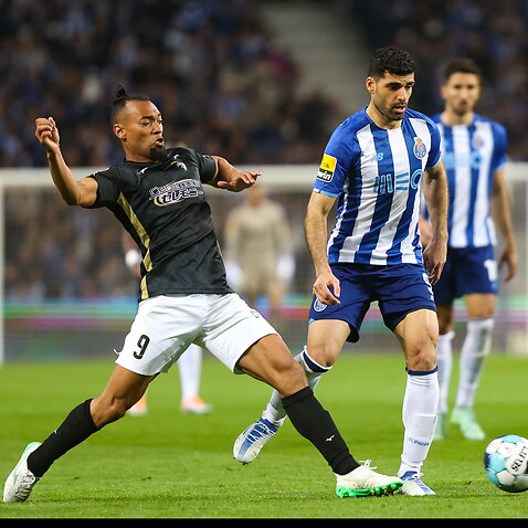 Porto, 04/16/2022 - Fc Porto hosted Portimonense tonight, at Estádio do Drago, in a game of the 30th round of the I Liga 2021/22. Fabricio , Taremi (Ivan Del Val/Global Images/Sipa USA)