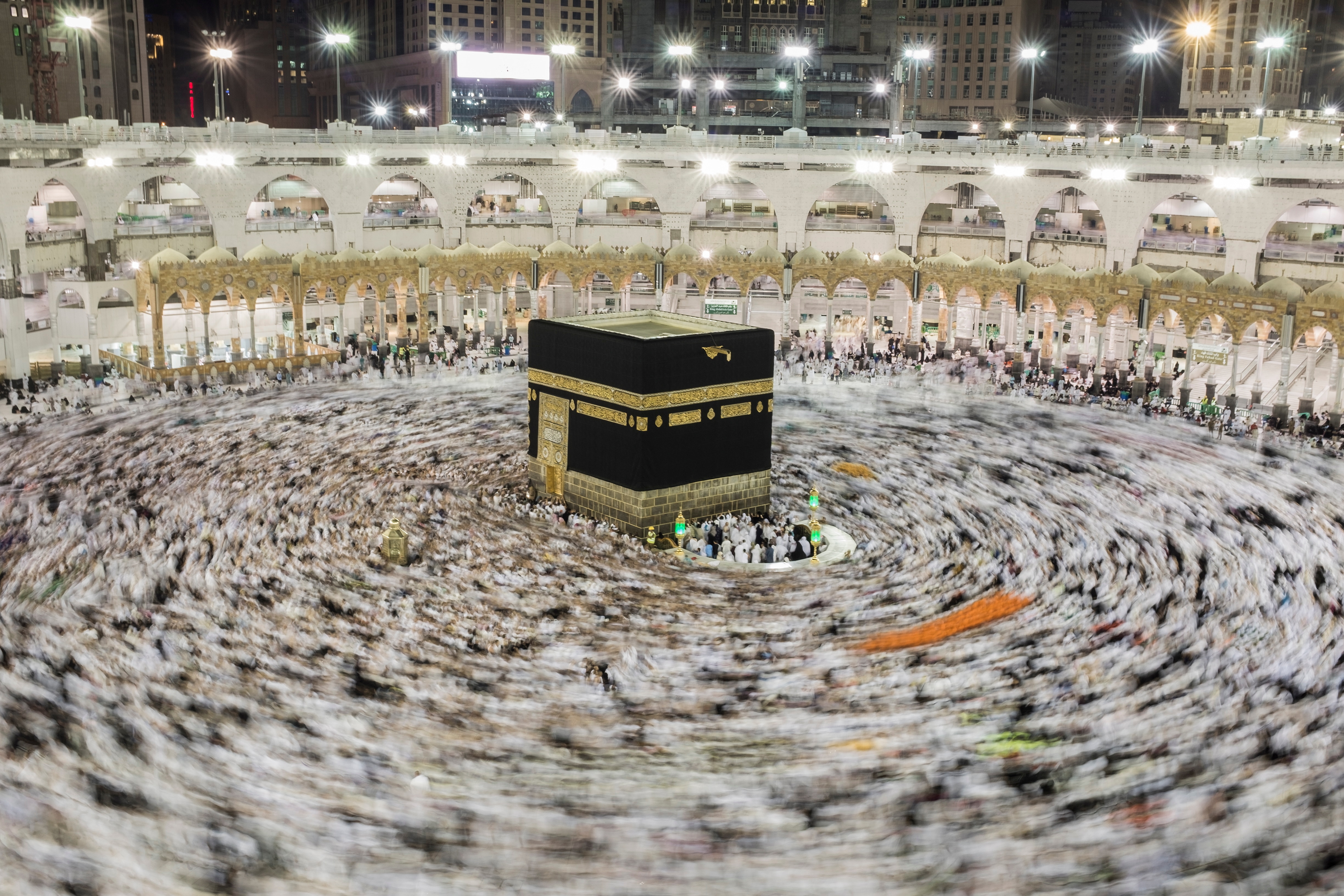 Muslim pilgrims circumvent the Kaaba at the Grand Mosque in Mecca, Saudi Arabia.