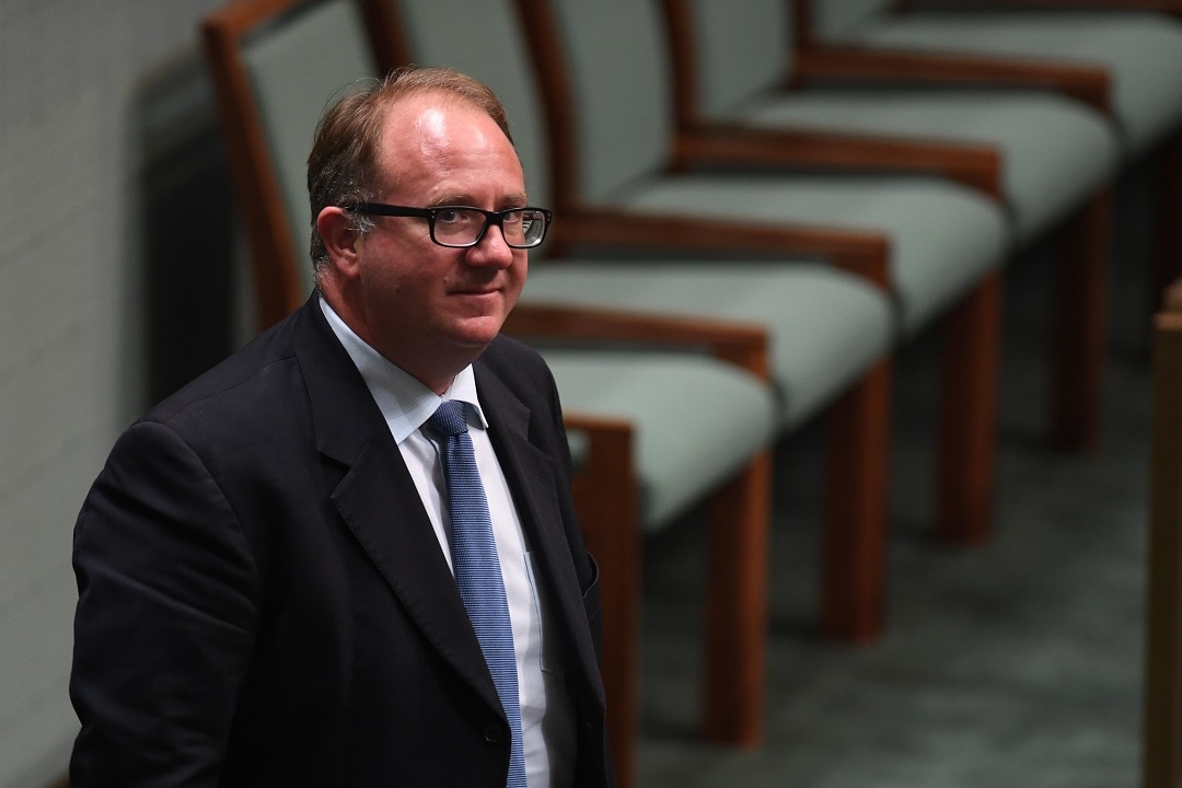 Labor MP David Feeney leaves the chamber after he was referred to the Court of Disputed Returns over citizenship issues in the House of Representatives at Parliament House in Canberra, Wednesday, December 6, 2017. (AAP Image/Lukas Coch) NO ARCHIVING
