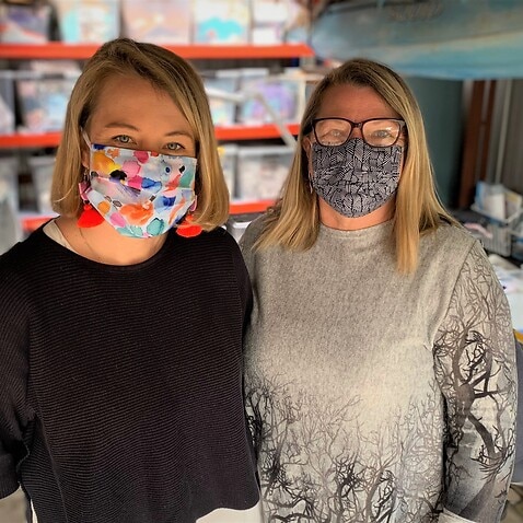 Amy and Marianne Buckley, wearing their home made masks.