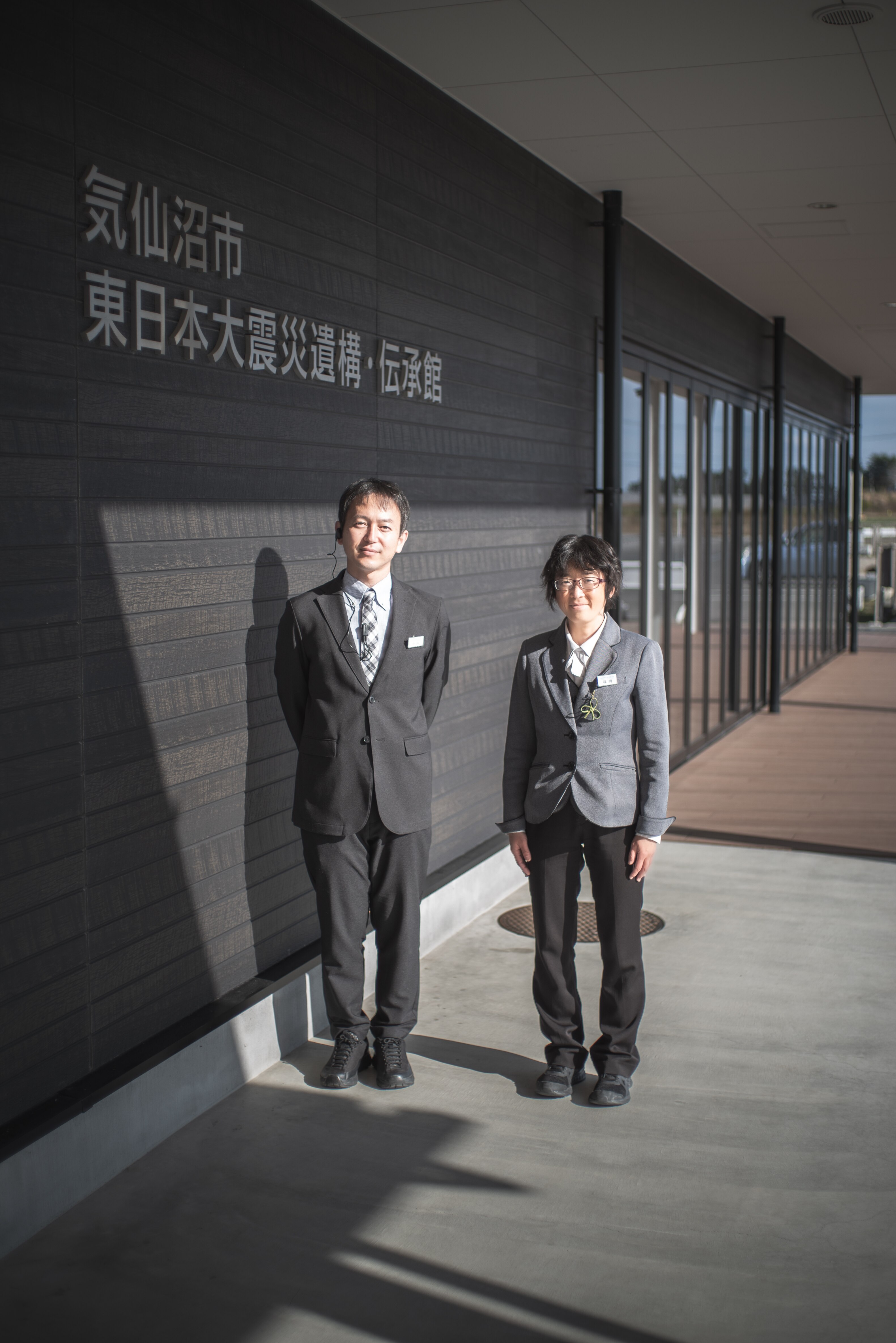 Asako Fukuoka (right) oversees youth storytellers program at the Ruins of the Great East Japan Earthquake Kesennuma City Memorial Museum