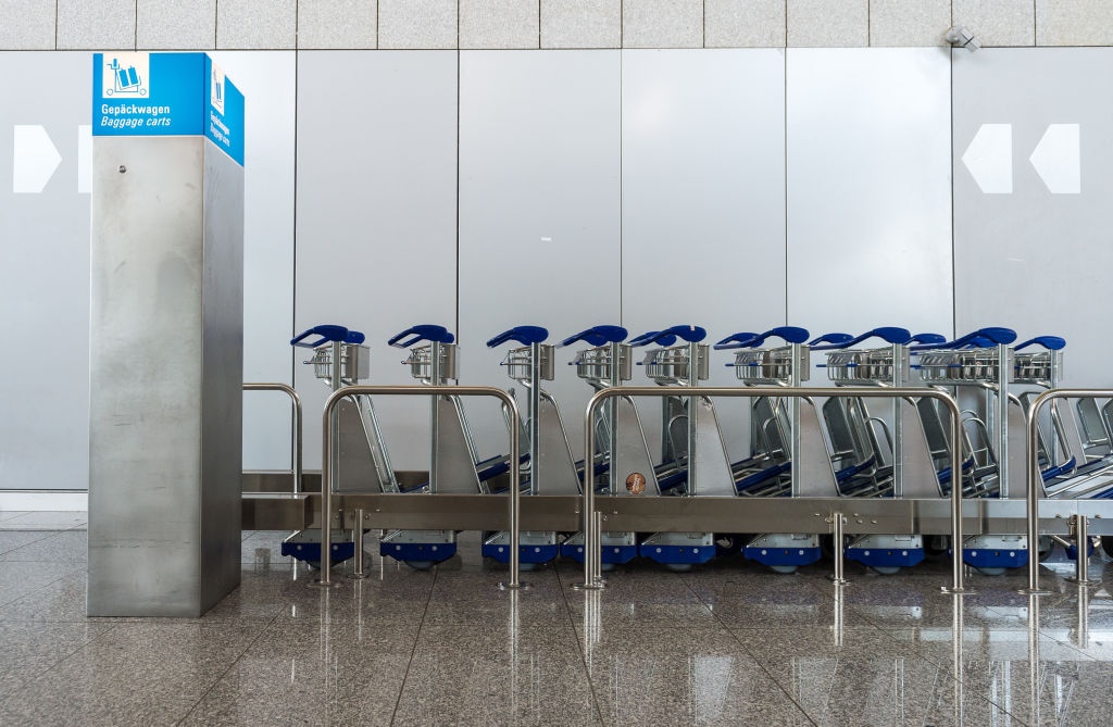 Baggage carts are standing up in Terminal 2 of Frankfurt Airport. 
