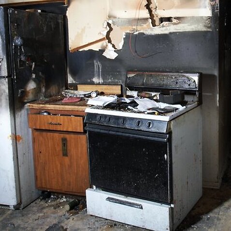 Charred kitchen in a house gutted by fire