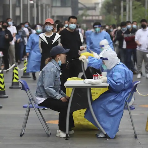 Local residents of Chaoyang District in Beijing take PCR tests as a large number of COVID-19 infections surge in China. The Beijing Health Bureau has requested all 3.45 million residents and commuters to have mandatory PCR tests three times five days.