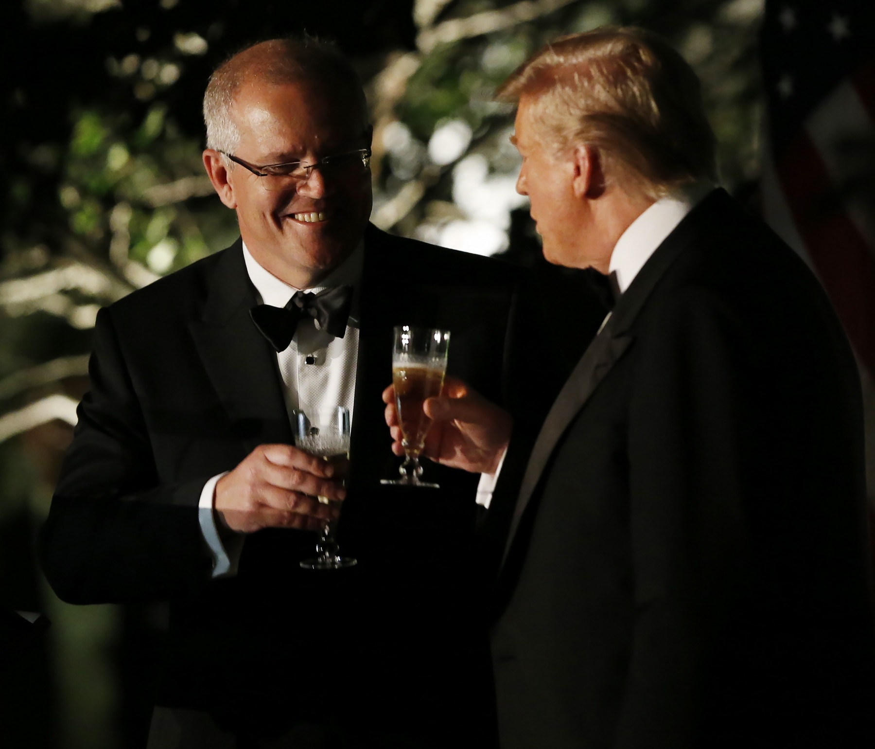 Scott Morrison and US President Donald Trump enjoy a drink at a state dinner at the Washington. 