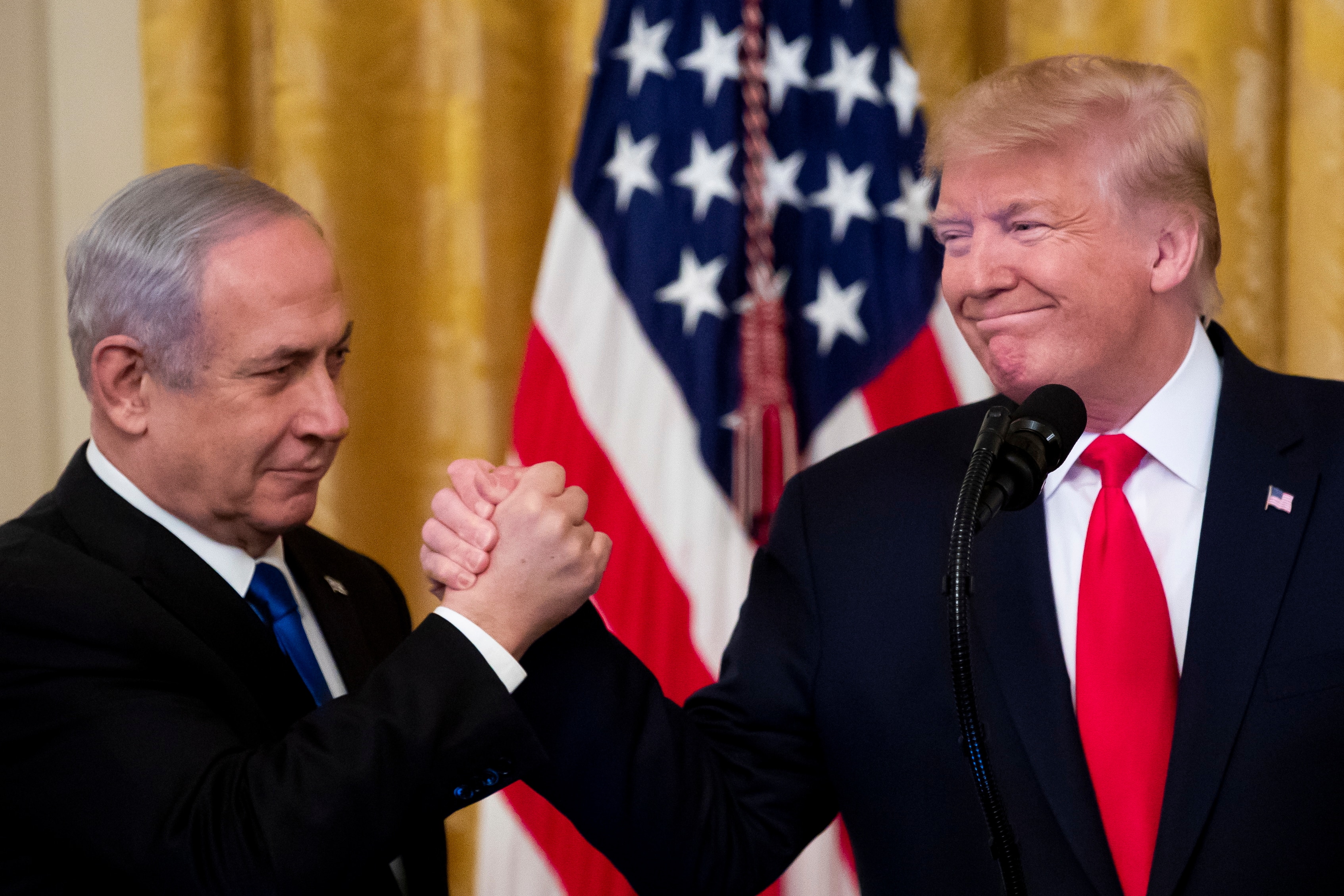 US President Donald J. Trump (R) shakes hands with Prime Minister of Israel Benjamin Netanyahu.