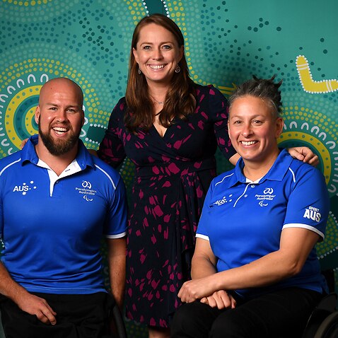 Australian Paralympic athletes Ryley Batt and Danni Di Toro pose for a photograph with Chef de Mission Kate Mcloughlin.