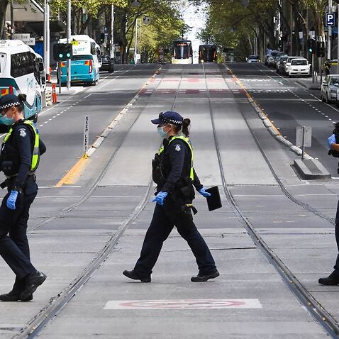 Police officers on patrol in Melbourne on 24 September, 2021.