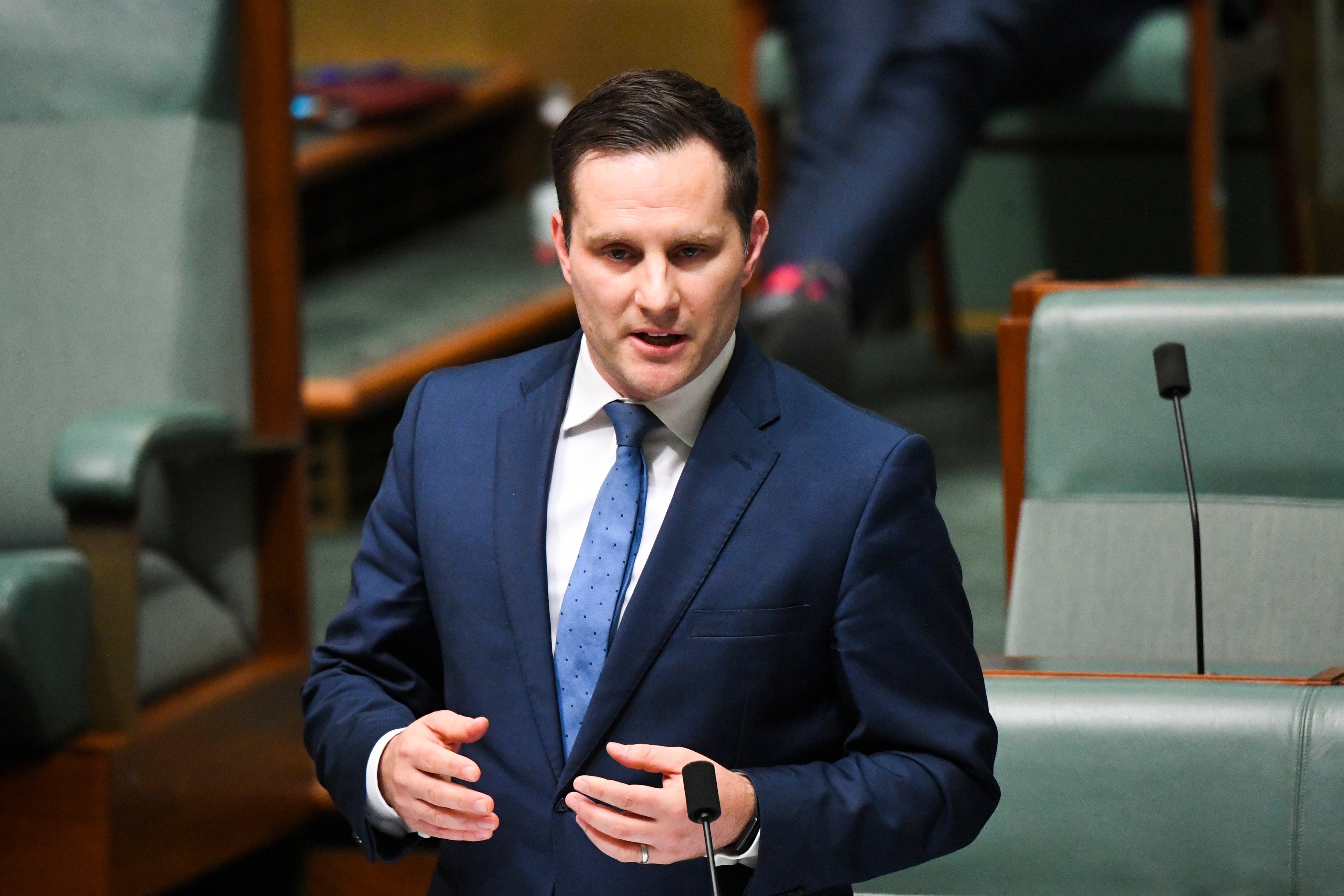 Immigration Minister Alex Hawke speaks during Question Time at Parliament House.