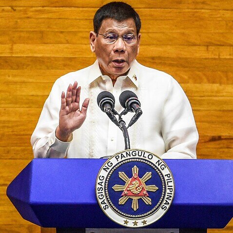 Philippine President Rodrigo Duterte gestures as he delivers his State of the Nation Address (SONA) in Quezon City, Metro Manila, Philippines, 26 July 2021. President Duterte delivered, in front of the Philippine Congress, the last SONA of his six-year te