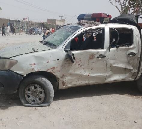 A damaged police vehicle after the suicide attack on a polling booth today.