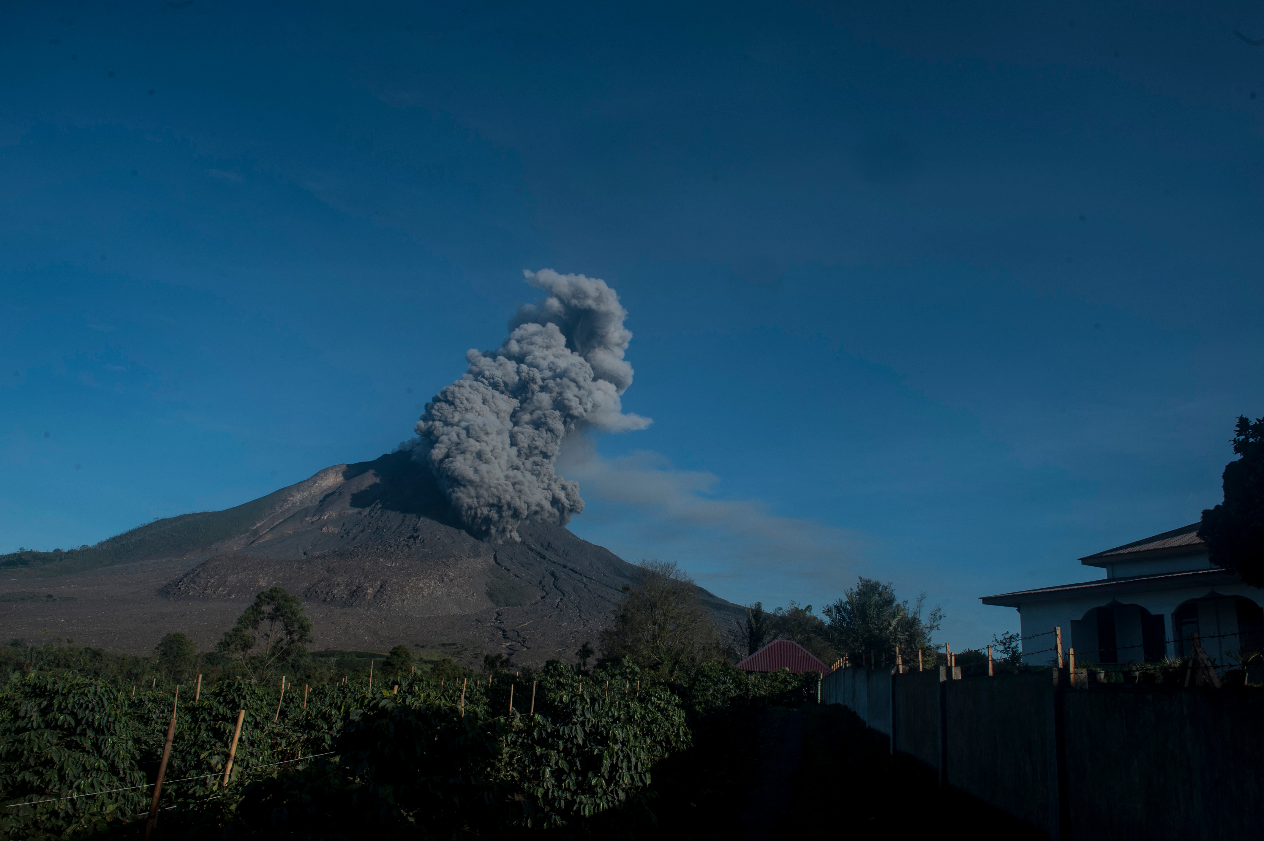 Authorities monitor Indonesia s Sinabung volcano  as it 