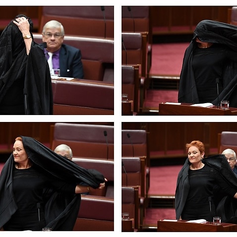 A combined picture of One Nation Senator Pauline Hanson taking off a burqa during Senate Question Time at Parliament House in Canberra.