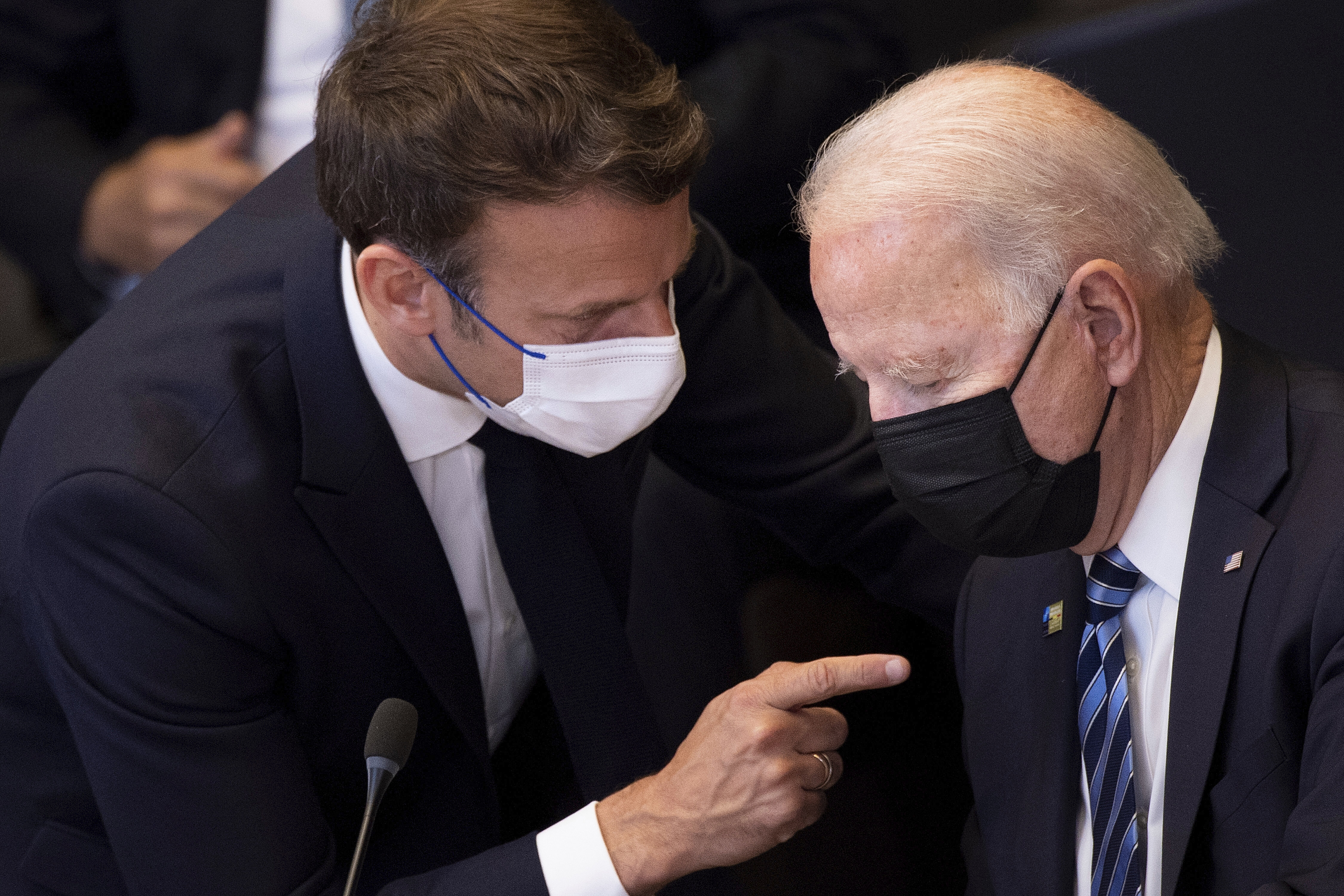 US President Joe Biden, right, speaks with French President Emmanuel Macron during a NATO summit back in June 2021.