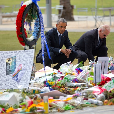 Barack Obama and Joe Biden visit a memorial to the Orlando victims