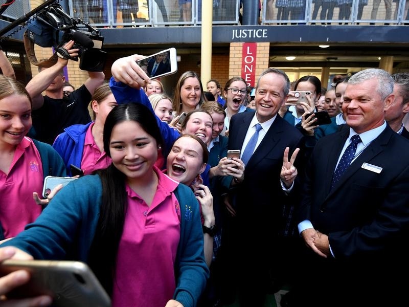 Bill Shorten surrounded by students at St. Joseph's in East Gosford,