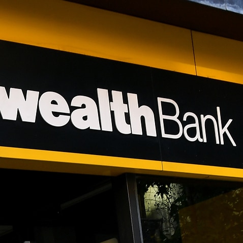 Signage at a Commonwealth Bank of Australia branch in Sydney, Wednesday, May 12, 2021. (AAP Image/Joel Carrett) NO ARCHIVING