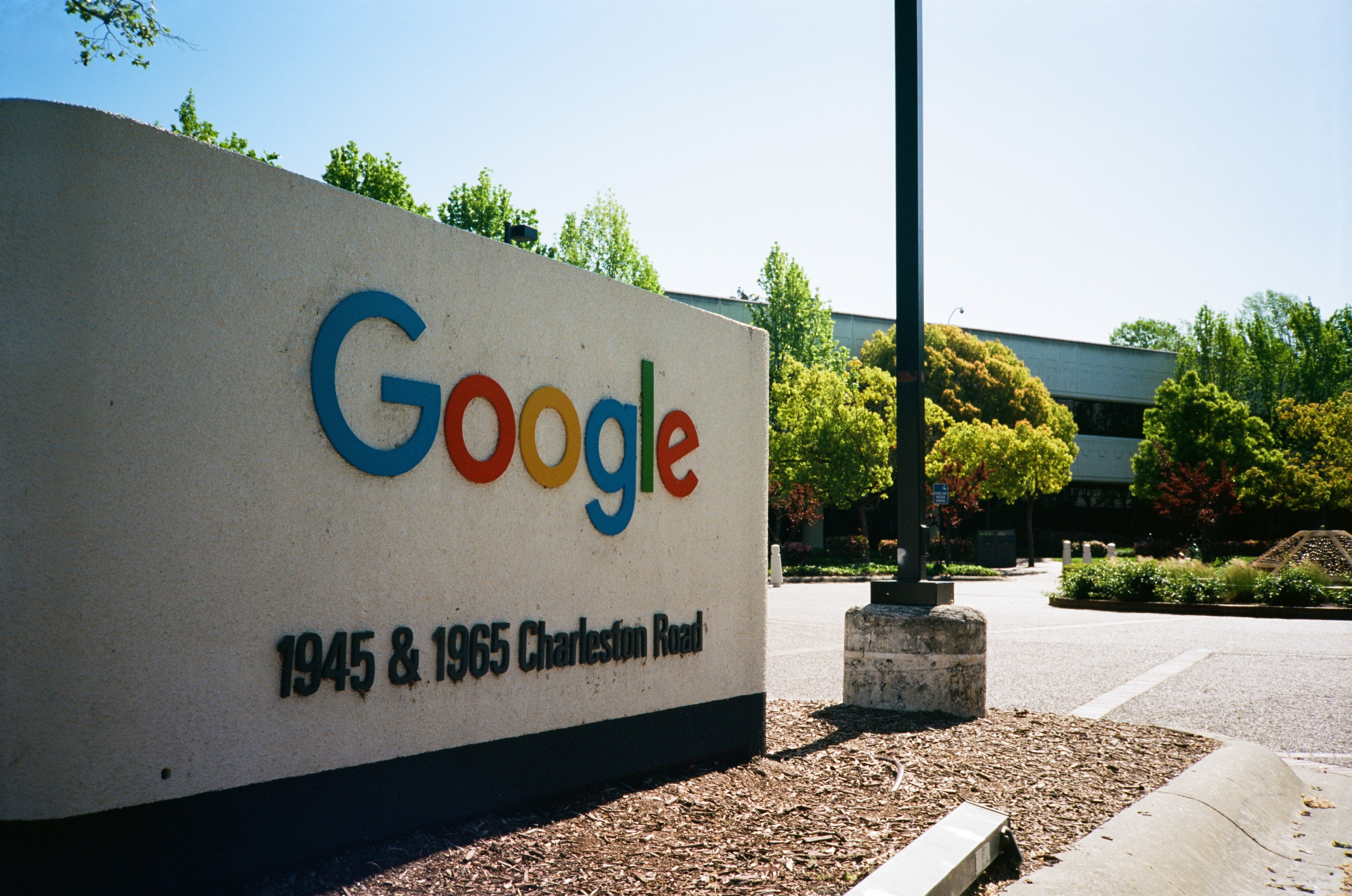 Close-up of sign and logo at the Googleplex, the Silicon Valley headquarters of search engine and technology company Google Inc in Mountain View, California.