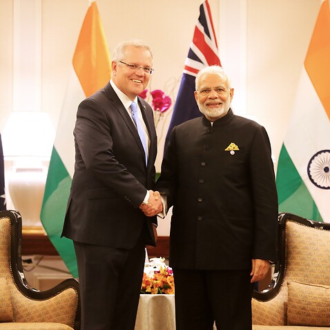 Australian Prime Minister Scott Morrison (L) met Indian Prime Minister Narendra Modi (R) at Singapore.