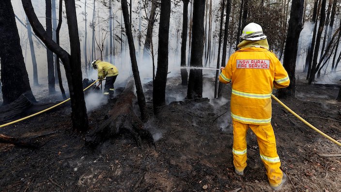 Firefighters manage a controlled burn near Tomerong, Australia, Wednesday, Jan. 8, 2020, in an effort to contain a larger fire nearby. 