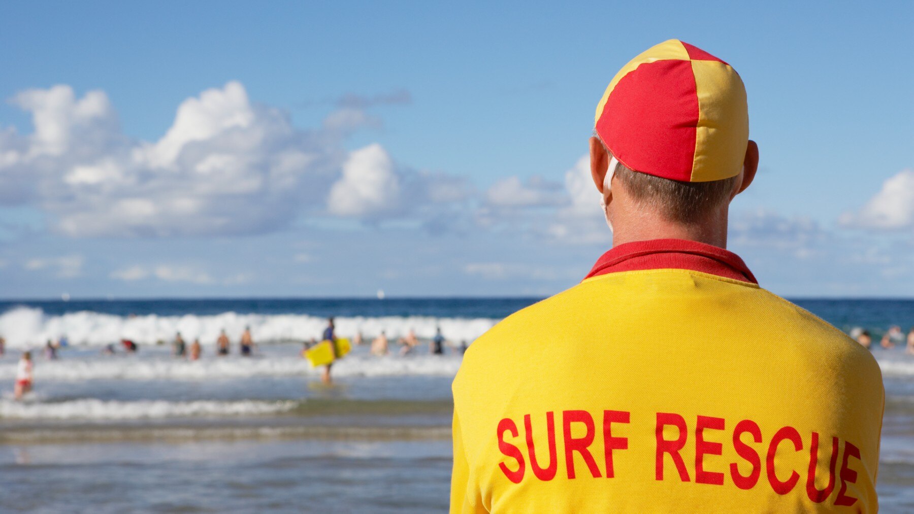 Australian lifeguards supervise swimmers between the flags 