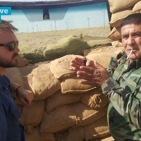 Wyatt Roy with a member of the Peshmerga in Sinjar area, west of Mosul, Iraq.