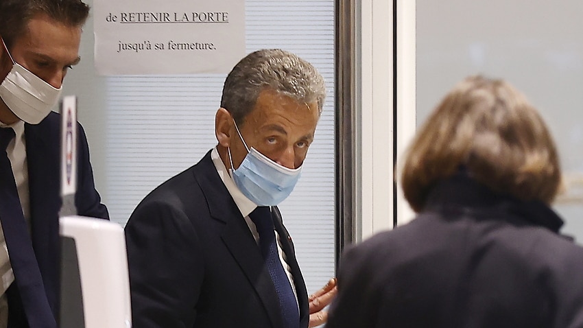 Former French president Nicolas Sarkozy leaves court after the judgment on his trial on corruption charges in Paris, France, 1 March 2021.