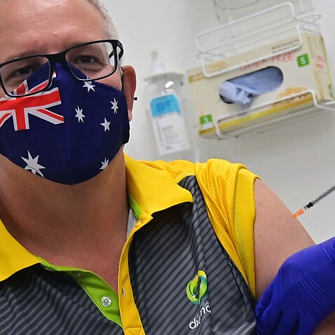 Australia's Prime Minister Scott Morrison receives a dose of the Pfizer Covid-19 vaccine  on February 21, 2021. 