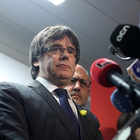 Ousted Catalan president Carles Puigdemont has demanded Madrid reinstate his regional government.