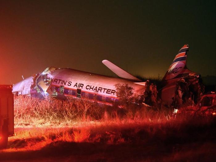Pilots injured in vintage Qantas plane crash remain in comas SBS News