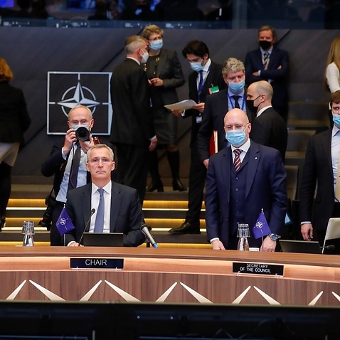 NATO Secretary General Jens Stoltenberg (c) at the start of a NATO summit on the situation in Ukraine on 25 February 2022.   