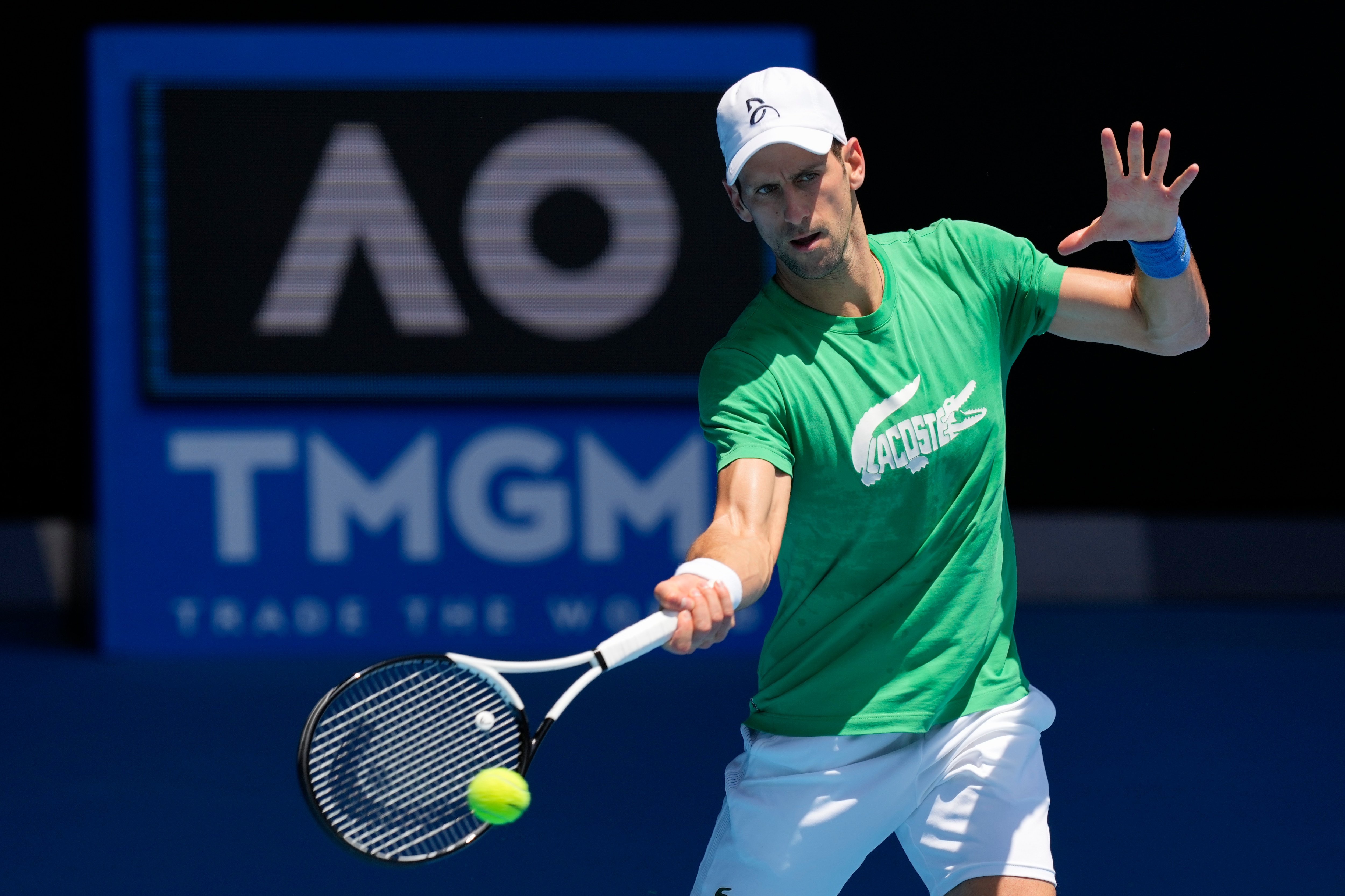 Novak Djokovic practices on Margaret Court Arena in Melbourne, Australia, Thursday, January 13, 2022.