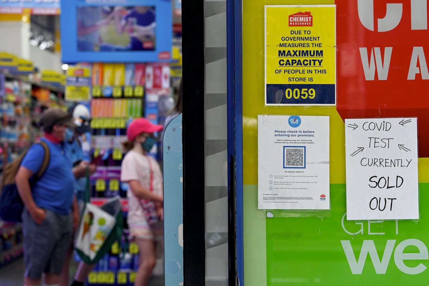Signage notifying customers that rapid antigen tests (RATs) are sold out is seen on the entrance to a chemist in Sydney, Tuesday, 11 January, 2022. 